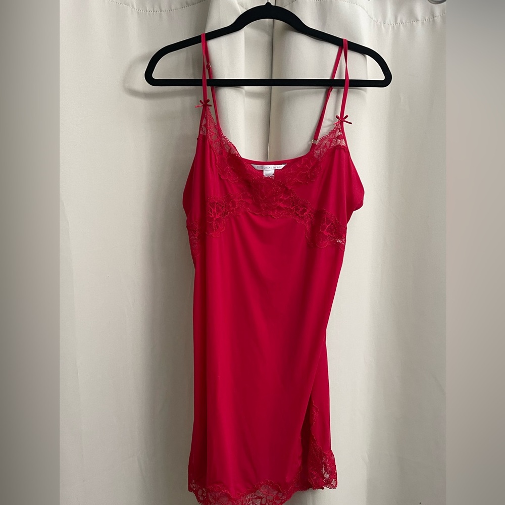 Victoria’s Secret red stretch lace lingerie. Small lace thigh slit. Very soft.